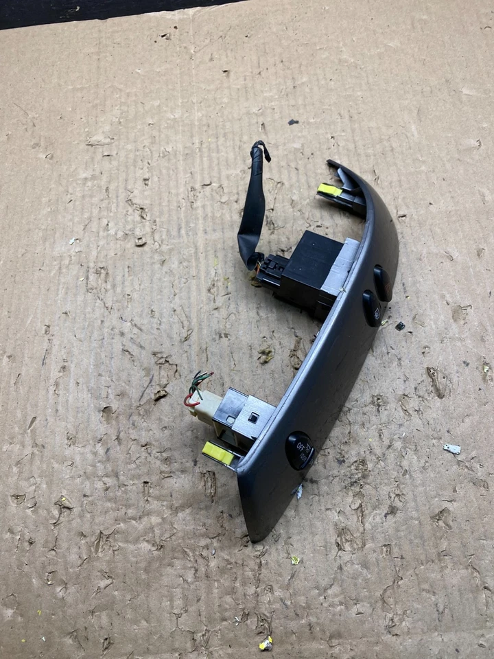 Interruptores climáticos laterales izquierdo Toyota Sienna 2004 a 2010 bisel moldura OEM T1562 DG Foto 2 de 4