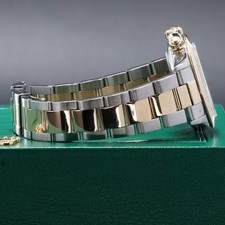 Rolex Daytona 40mm Two-Tone Black/Champagne Dial YG Bezel Oyster 16523 14