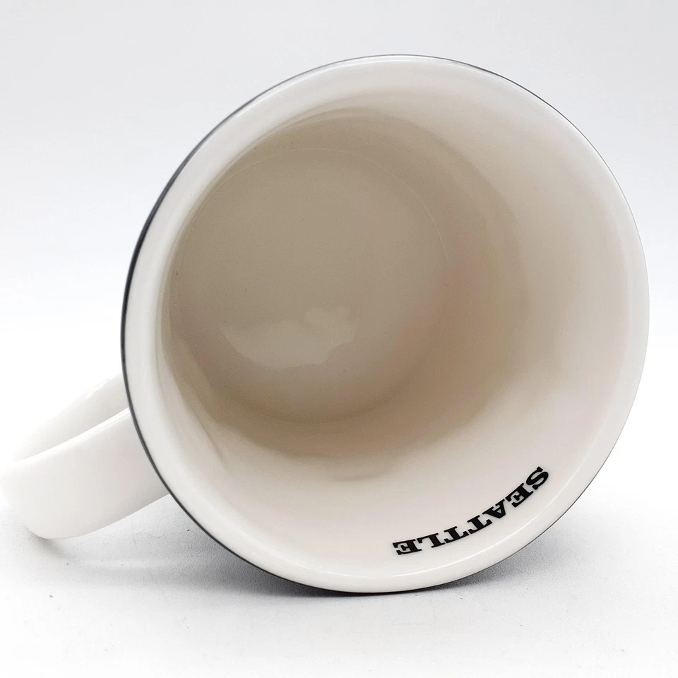 Taza Starbucks Seattle Collector Series Relief City Skyline negra blanca 2012 Foto 4 de 4