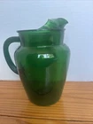 vintage Anchor Hocking Forest Green Glass Pitcher with ice lip and ribbed handle