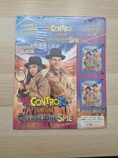 STARTER PACK ALBUM FIGURINE VUOTO + BUSTINE ME CONTRO TE Operazione Spie