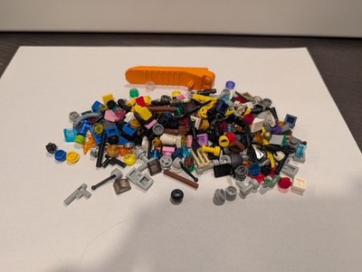 Lego Dimensions over 100 spare parts weapons, tools, studs, etc great for resale