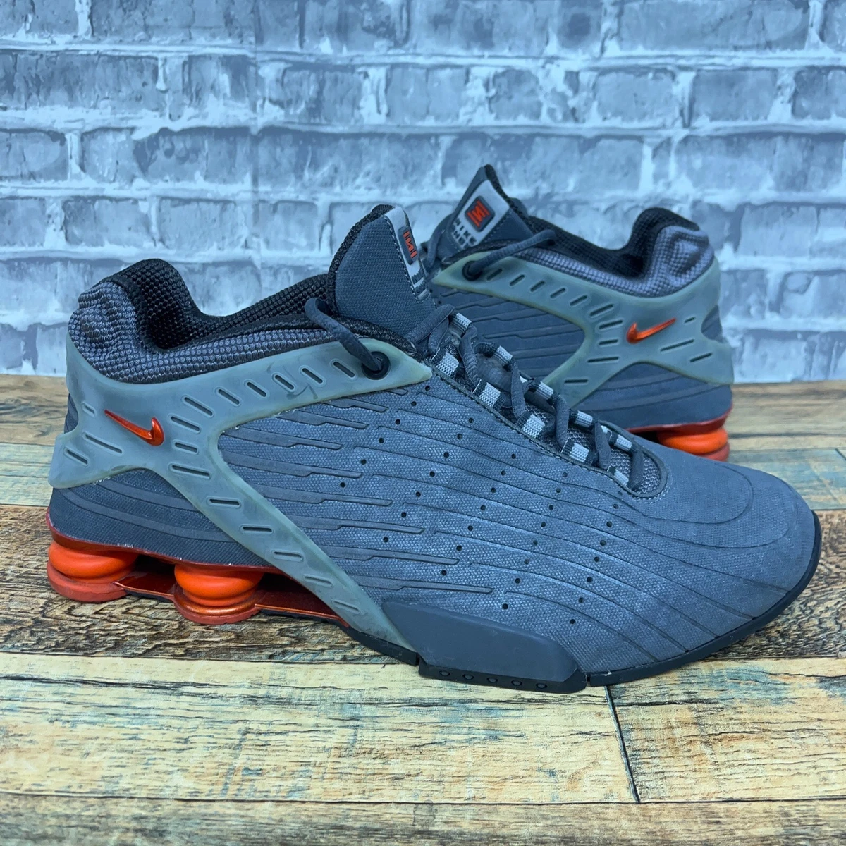 Nike shox grey and orange sale
