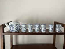 vintage Japanese blue and white porcelain tea set featuring a bamboo design