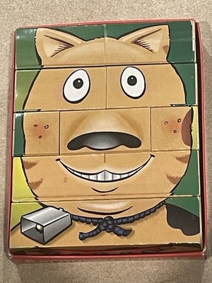 Vintage Changeable Wooden Barnyard Change-A-Face Puzzle Made in the USA.