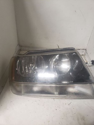 Used Right Headlight Assembly fits: 2004 Jeep Grand cherokee smoke tint dark bac