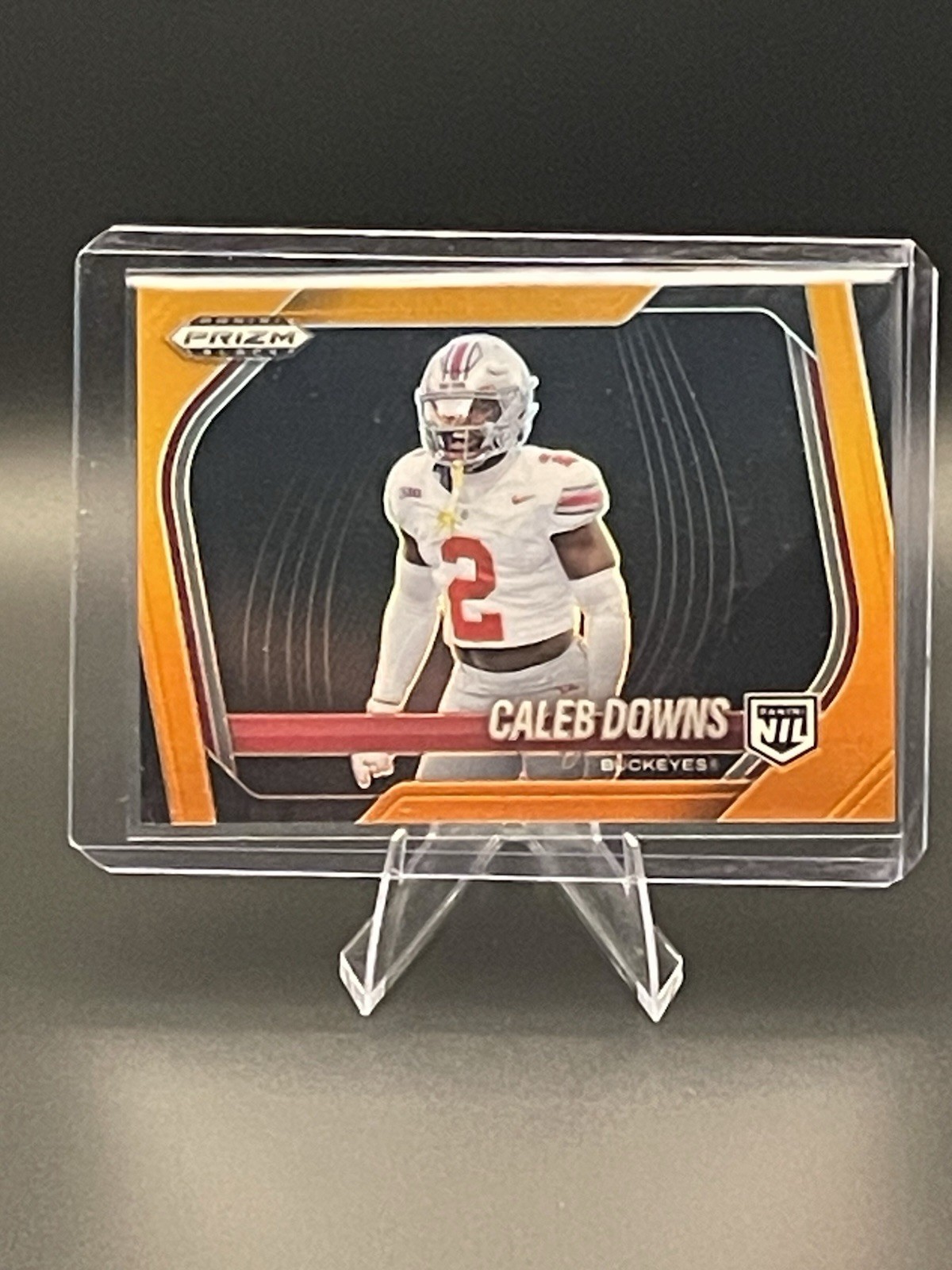 2025 Panini Prizm Black Prospects Orange Prizm /49 Rookie #190 Caleb Downs Buck…