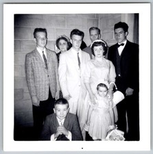 Vtg B&W Snapshot Family Group Formal Attire Suits Dresses Cinder Block Wall