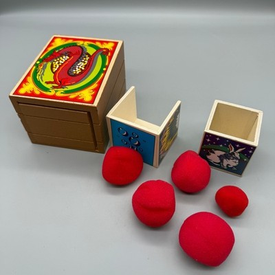 Dragon Puzzle Box with red fluff balls nesting box 