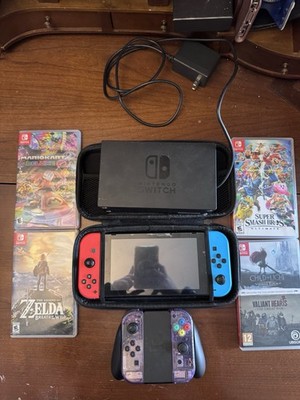 Nintendo Switch Hybrid Console w/ Dock. Includes 5 games.