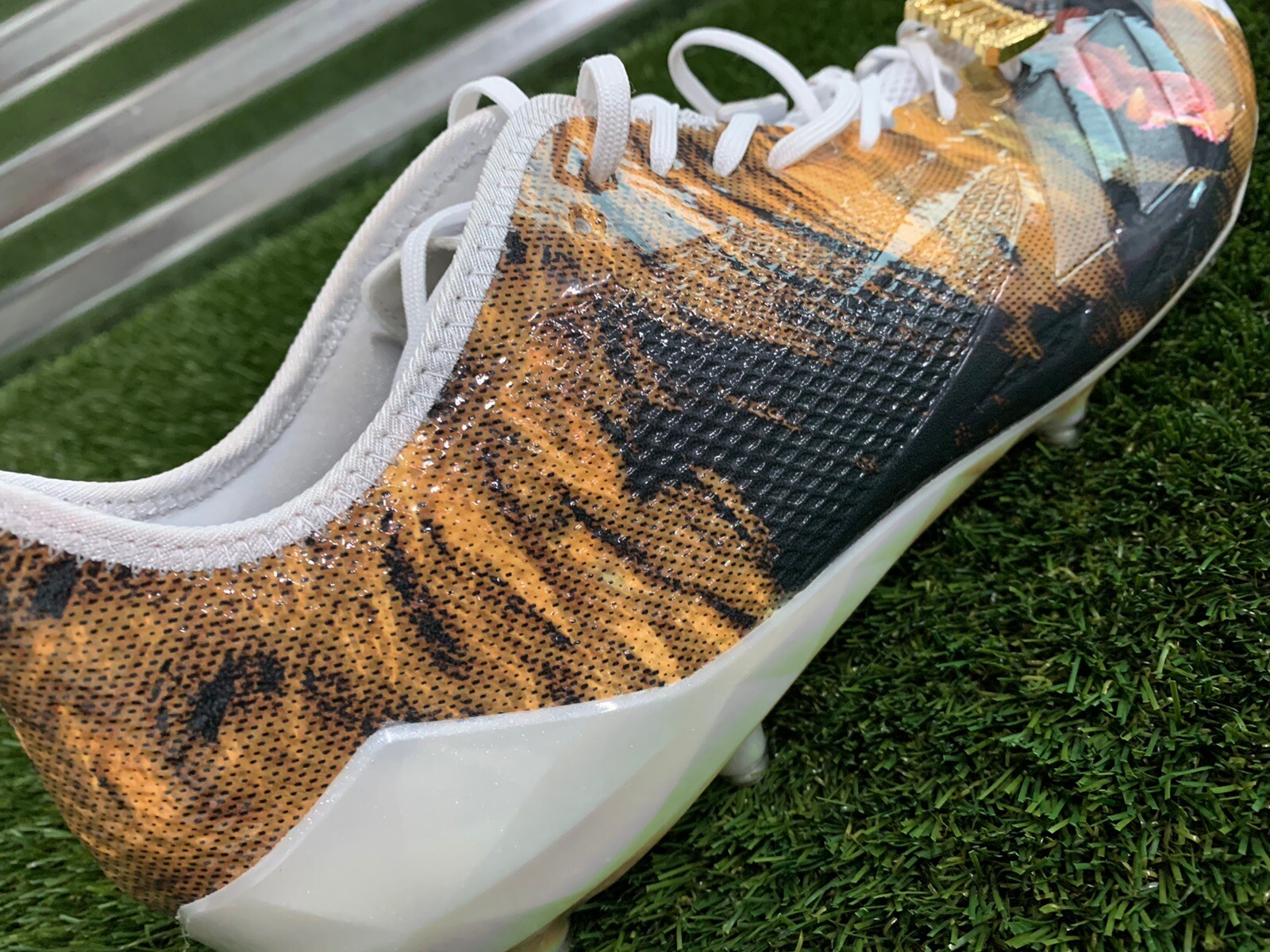 adidas lion cleats