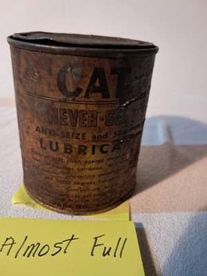 Caterpillar Never-Seez Lubricant Advertising Can Brown Black Gas & Oil Theme