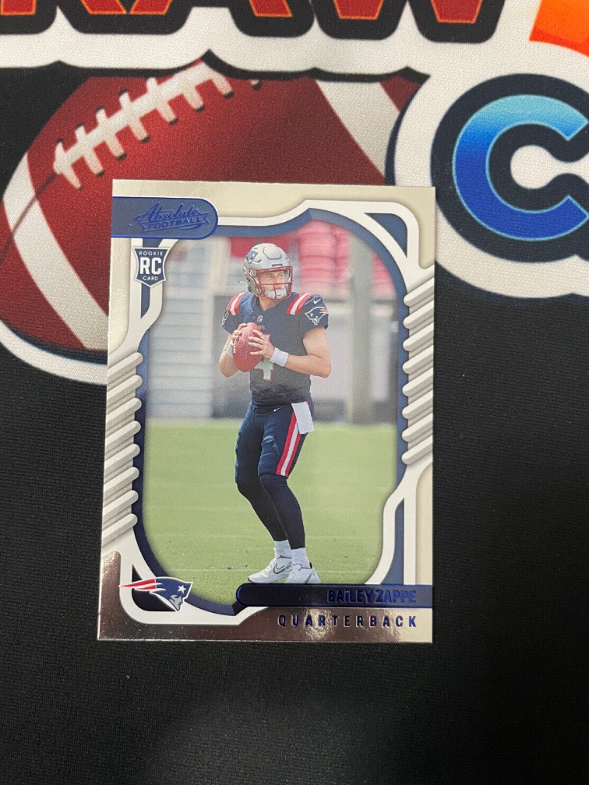 2022 Panini Absolute Football Bailey Zappe Blue Parallel RC Rookie #129-Patriots
