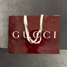 Lotto shopping bag e scatole Gucci e nastro