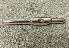 Piccolo headjoint.  Appears to be silver plated.