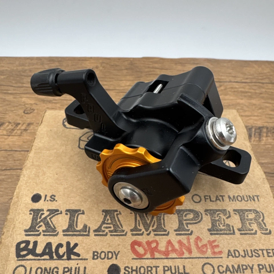 Pinza de disco Paul Component Engineering Klamper, tracción corta, negra con naranja Foto 2 de 4