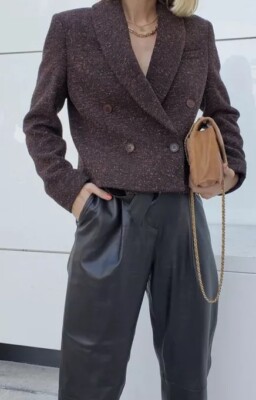 Anine Bing features double breasted closure with a cropped, boxy fit Blazer S/p