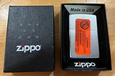 Zippo Lighter, NIB, never fired, seal in tact. 205 regular satin chrome