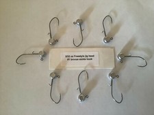 25 Hand made 3/32 oz w/ keeper freestyle jig heads with a #1 bronze sickle hooks