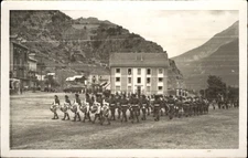 WWI? Soldiers marching through town drums berets ~ unknown location real photo