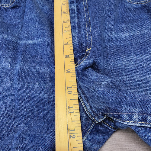 Blue denim high-rise straight-leg Lee jeans with front pockets, yellow measuring tape along the waistband.