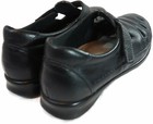 Black leather SAS Roamer women’s casual shoes with lace-up front, mesh sides, and padded collars and tongues.