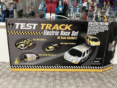 * TEST TRACK ELECFTRIC RACE SET DISNEY THEMED HO SLOT CAR SET *ST