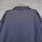Dark blue men's full zip jacket with notch lapel, hanging on white hanger against light gray textured background.
