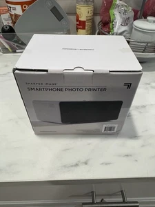 Sharper Image Smartphone Photo Printer 207579-01  New in Box - Unsealed