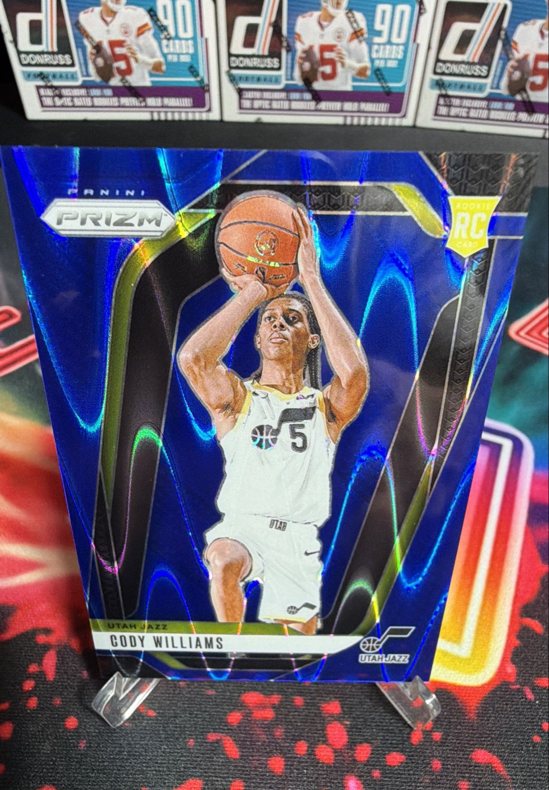 2024-25 Panini Prizm - Cody Williams #232 Blue Seismic Prizm /99 (RC)