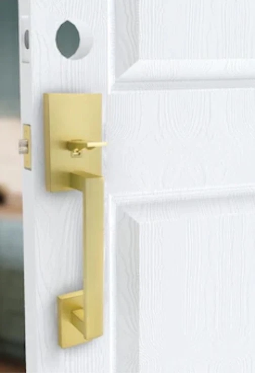 Manija de puerta de entrada interior/exterior oro satinado Honeywell 8120007.       91 Foto 3 de 4