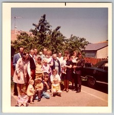 Vtg Color Snapshot Large Family Group Outdoors By Tree And Classic Car 1970s