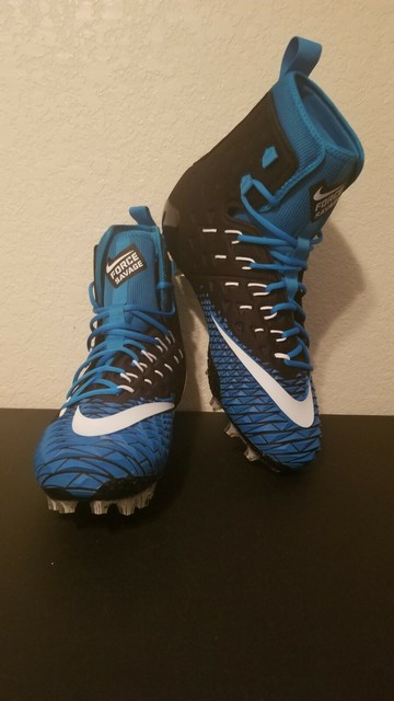 teal color football cleats