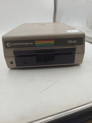 Commodore 1541   Floppy Disk Drive-Runs  Does Not Read