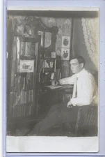 Real Photo Postcard RPPC - Interior Scene w Man Writing at Desk with Bookcase