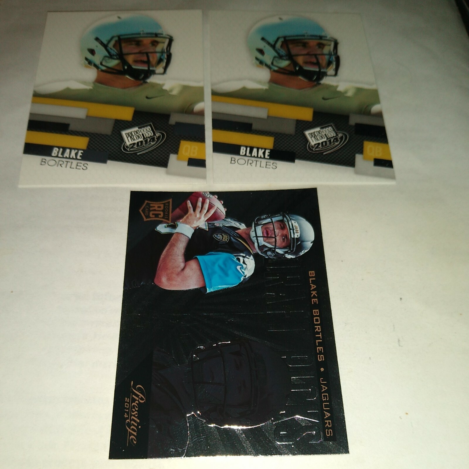 BLAKE BORTLES 2014 PRESTIGE DP RC #3, PRESS PASS RC #6 (X2) JAGUARS UCF KNIGHTS