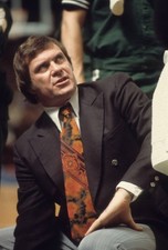 Boston Celtics head coach Tom Heinsohn speaks to team during game - Old Photo