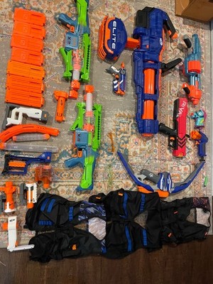 nerf blaster lot with Titan cs 50 and other blasters, magazines, and accessories