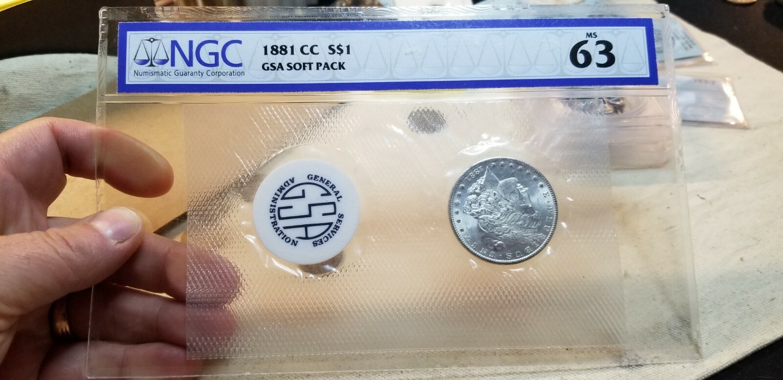 1881-CC Morgan Silver Dollar GSA Soft Pack NGC 63