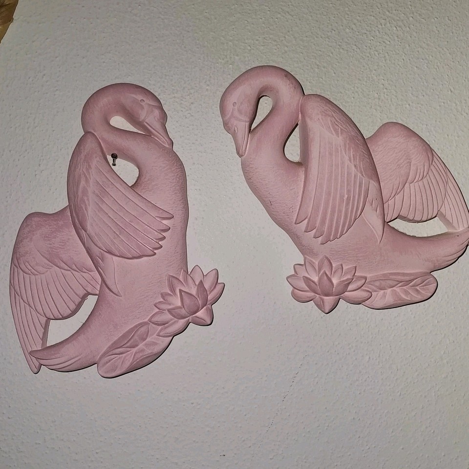 Genuine 1960s chalkware plaster swans in that unmistakable MCM wall-art style — the kind of kitsch-cool find that elevates any gallery wall.