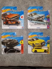 Hot Wheels Ferrari F40, Nissan, Impala und Audi RS 6