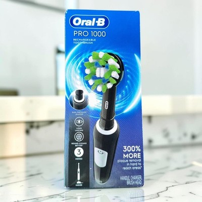 New Black Oral-B Pro 1000 Rechargeable Electric Toothbrush Handle Charger Head
