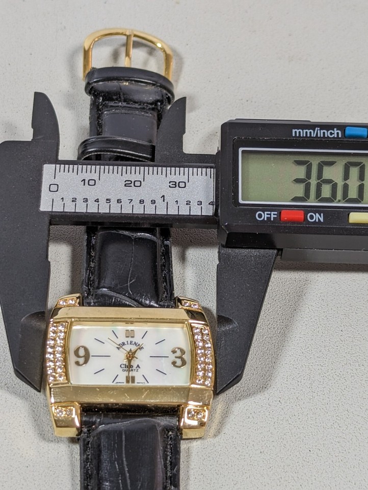 Adrienne Pearlized Dial Crystal Accent Gold Tone Case Black Band Watch