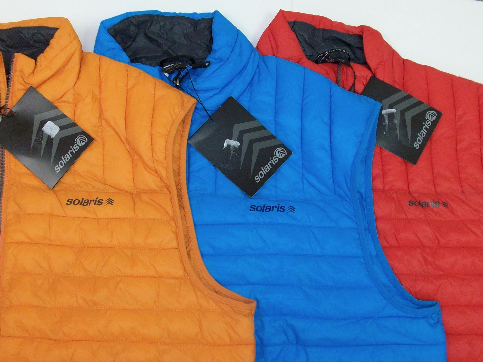 Solaris Lightweight Quilted Puffer Vest $99 Red Orange Blue Zippered Pockets NWT