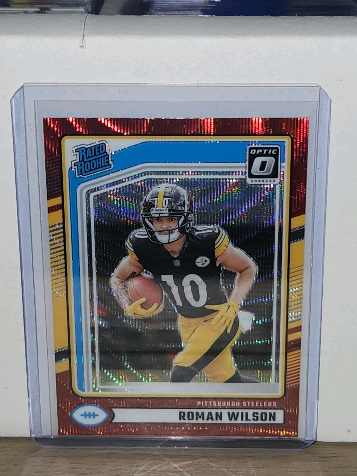 2024 Panini Donruss - Rated Rookie Roman Wilson #348 Optic Preview Red Wave (RC)