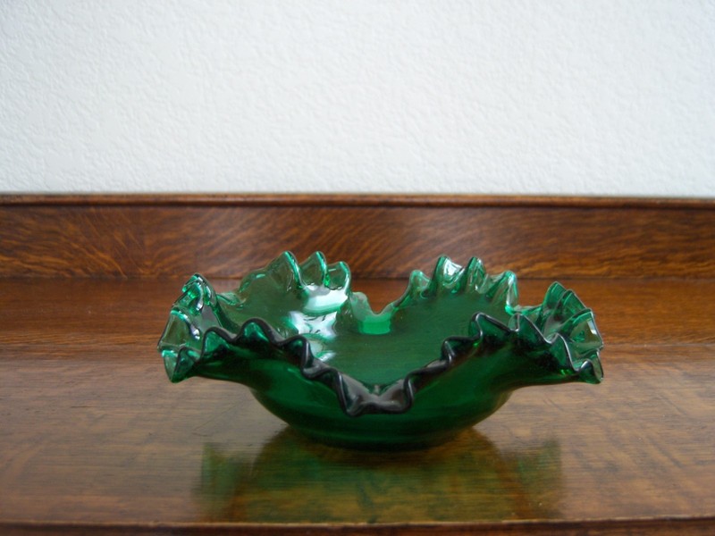 Small green hand blown candy dish, scalloped edge