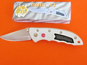 Frost Cutlery Bobcat Button Lock Folder 6 1/2” Open. 3 1/2" Closed. 3” blade.