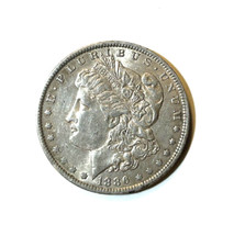 1886-O MORGAN SILVER DOLLAR in Extremely Fine to Almost Uncirculated condition