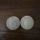 Pair Of 1900 Morgan Silver Dollars Minted In New Orleans