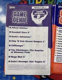 NES Game Genie W/ Code Books & Update Pamphlets Volume 1 & 2